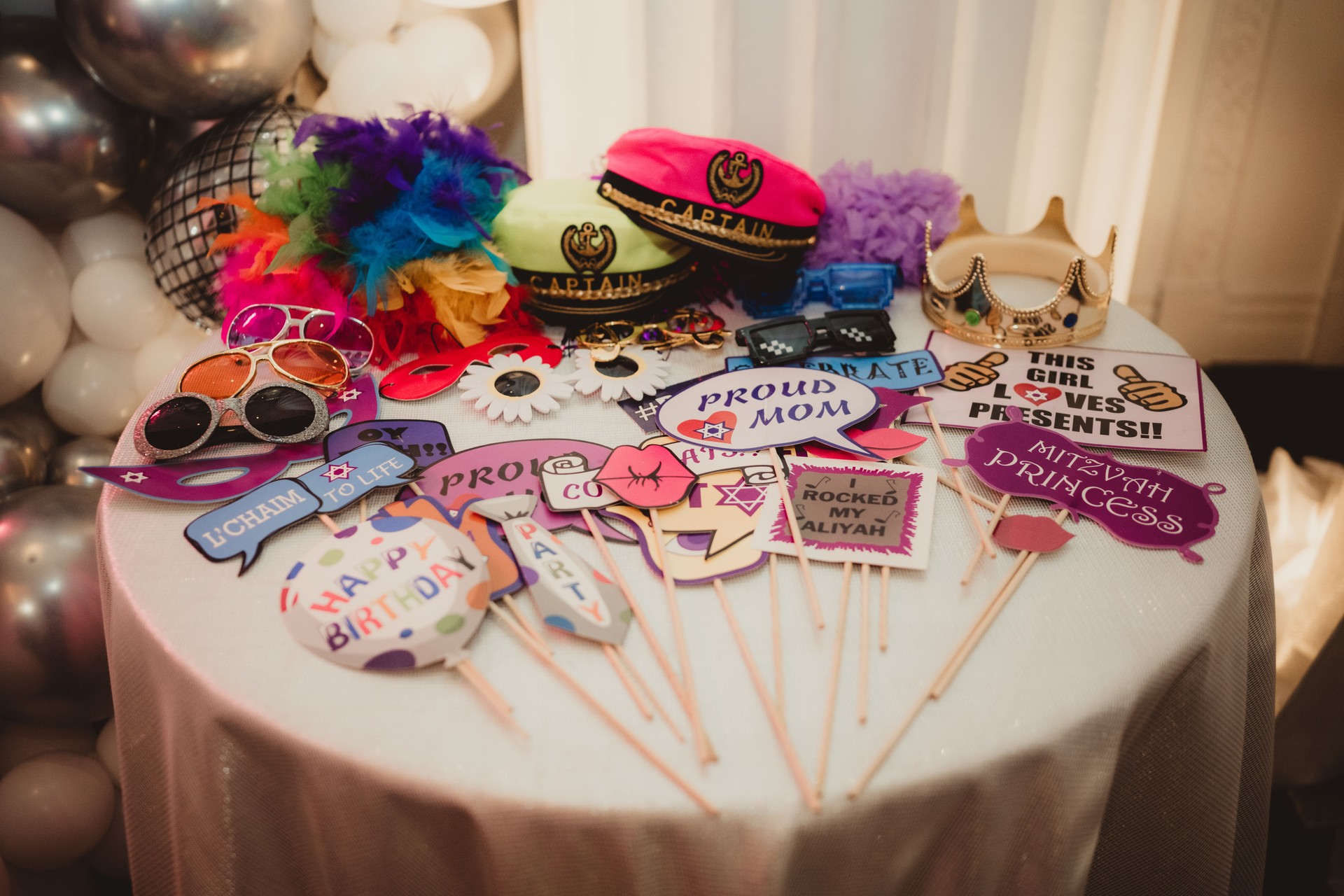 Mitzvah Photo Booth props with glasses, hats and signs